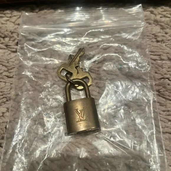 Louis Vuitton Monogram Brown Duffel Bag with Tan Accents - Picture 9 of 12